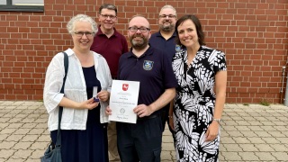 Erste Kreisrätin Regina Tryta, Fachdienstleiter Christian Groth, Kreisbrandmeister Dennis Körter, Schichtleiter A Technische Einsatzleitung Andrej Thran und Fachbereichsleiterin Dr. Stephanie Fries (v.l.).